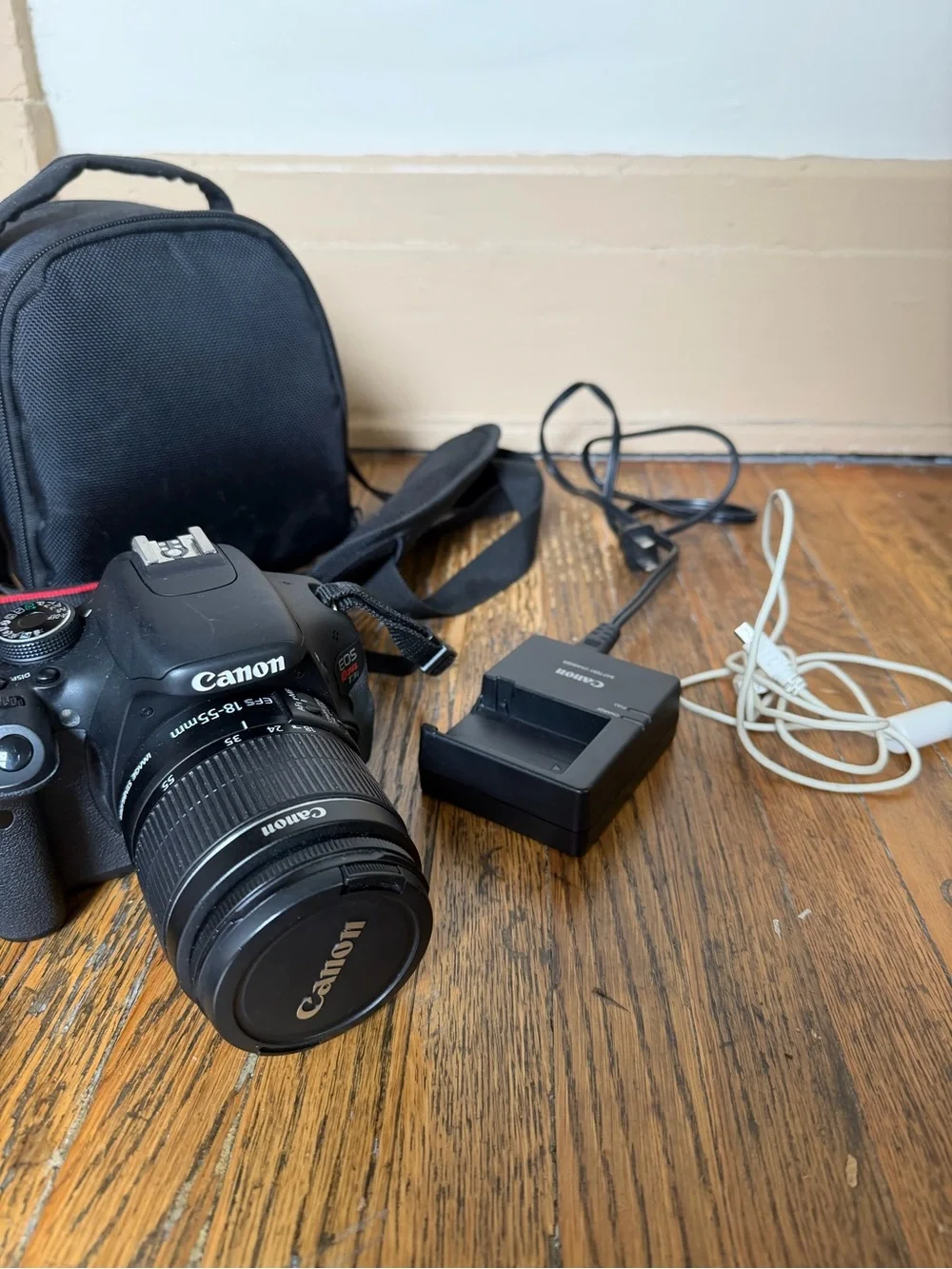 Canon Rebel T3i DSLR Camera, Charger, Bag, Connector Cables, Red-Trim Strap